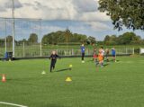 Eerste training S.K.N.W.K. JO11-1jm seizoen 2023-2024 (50/80)